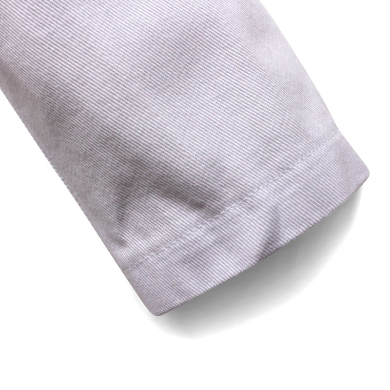 sleeve of children's chef costume in white cotton twill